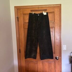 Women Size 12 black barrel Jean/pant. Adorable cut, material is like butter!